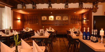 Hotels und Ferienwohnungen im Oberallgäu - Zahlung: Bar - Zum Wilde Männle - Restaurant in Oberstdorf im Allgäu - Zum Wilde Männle - Traditionsgaststätte in Oberstdorf