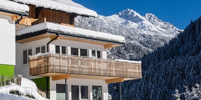 Hotels und Ferienwohnungen im Oberallgäu - Parken & Anreise: kostenloser Parkplatz - Vorarlberg - Außenaufnahme im Winter | DAS KLEEMANNs - DAS KLEEMANNs - Urlaub erfrischend anders