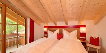 Hotels und Ferienwohnungen im Oberallgäu - Unterkunftsart: Hotel - Bayern - Hahnenköpfle Lodge - Ferienwohnungen in Oberstdorf im Allgäu - Hahnenköpfle Lodge  - wohnen wie im siebten Himmel