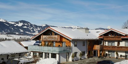 Hotels und Ferienwohnungen im Oberallgäu - Parken & Anreise: Anreise mit ÖPNV möglich - Fischen im Allgäu - Alpin Hotel  bichl 761 im Winterkleid - Alpin Hotel bichl 761