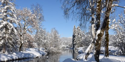 Hotels und Ferienwohnungen im Oberallgäu - Freizeit: Skifahren - Fischen im Allgäu - Winterlicher Spaziergang entlang der Iler - Alpin Hotel bichl 761