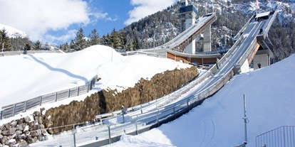 Hotels und Ferienwohnungen im Oberallgäu - Alljährlicher Auftakt zur Vierschanzentournee in der ORLEN Skisprung Arena Oberstdorf im Allgäu - ORLEN Skisprung Arena in Oberstdorf im Allgäu