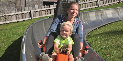 Hotels und Ferienwohnungen im Oberallgäu - Kinder & Familie: kinderwagengeeignet - Sommerrodelbahn am Hündle in Oberstaufen im Allgäu - Sommerrodelbahn am Hündle in Oberstaufen im Allgäu