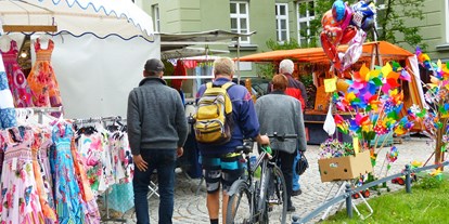 Hotels und Ferienwohnungen im Oberallgäu - Parken & Anreise: Anreise mit ÖPNV möglich - Der Maimarkt in Immenstadt - Maimarkt in Immenstadt 2024