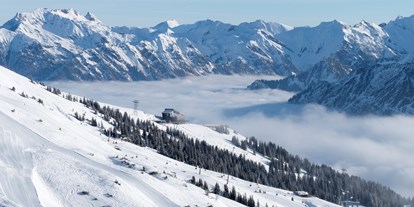 Hotels und Ferienwohnungen im Oberallgäu - Kategorien: Skigebiet - Vorarlberg - Pistenvergnügen grenzenlos an der Kanzelwandbahn im Kleinwalsertal - Die Kanzelwandbahn - grenzenloses Wintervergnügen