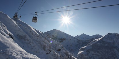 Hotels und Ferienwohnungen im Oberallgäu - Kategorien: Skigebiet - Pistenvergnügen grenzenlos an der Kanzelwandbahn im Kleinwalsertal - Die Kanzelwandbahn - grenzenloses Wintervergnügen