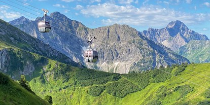 Hotels und Ferienwohnungen im Oberallgäu - Saison: Sommer - Riezlern Riezlern - Ort - Kanzelwandbahn in Riezlern im Kleinwalsertal  - Die Kanzelwandbahn - grenzenloses Wander- und Bergerlebnis