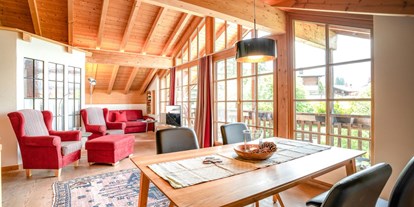 Hotels und Ferienwohnungen im Oberallgäu - Alpenhaus Oberstdorf - Wohnzimmer App. 402 | weitBLICK - ALPENHAUS Oberstdorf