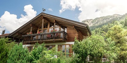 Hotels und Ferienwohnungen im Oberallgäu - Unterkunftsart: Chalet / Ferienhaus - Alpenhaus Oberstdorf - Außenansicht - ALPENHAUS Oberstdorf