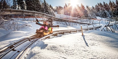 Hotels und Ferienwohnungen im Oberallgäu - Wetter: bei schönem Wetter - Deutschland - Alpsee Bergwelt mit Alpsee Coaster im Winter - Alpsee Bergwelt mit Alpsee Coaster im Winter