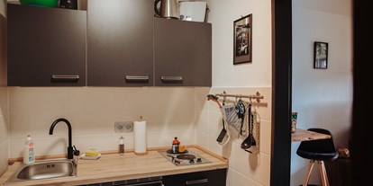 Hotels und Ferienwohnungen im Oberallgäu - Ausstattung: Waschmaschine - Küche / Essbereich - Pura Vida Workation & Ferienwohnung