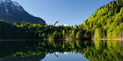 Hotels und Ferienwohnungen im Oberallgäu - Wetter: bei jedem Wetter - Naturfreibad Freibergsee bei Oberstdorf - Naturfreibad Freibergsee mit Bootsverleih bei Oberstdorf