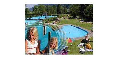Hotels und Ferienwohnungen im Oberallgäu - Oberstaufen - Freibad Thalkirchdorf