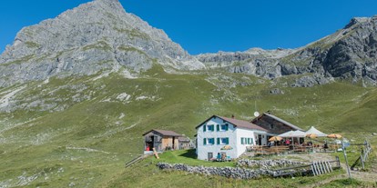 Hotels und Ferienwohnungen im Oberallgäu - Saison: Sommer - Österreich - Widdersteinhütte gegenüber den Lechtaler Alpen
