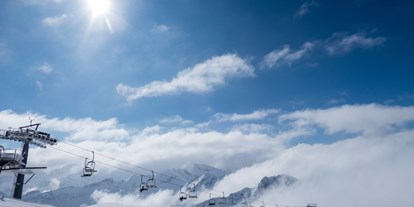Hotels und Ferienwohnungen im Oberallgäu - Parken & Anreise: kostenpflichtige Parkplätze - Bayern - Skigebiete im Allgäu - die Nebelhornbahn über Oberstdorf - Die Nebelhornbahn im Winter 