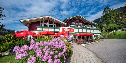 Hotels und Ferienwohnungen im Oberallgäu - Parken & Anreise: Anreise mit ÖPNV möglich - Kleinwalsertal - Gasthof Alpenblick  - Alpenblick