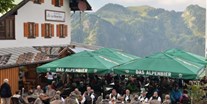 Hotels und Ferienwohnungen im Oberallgäu - Bad Hindelang An der Hornbahn - "Alphorn und Musik" mit den Hindelanger Alphornbläser und der "Stammtisch Museg" - Musik am Horn 2024 mit "Alphorn & Musik"